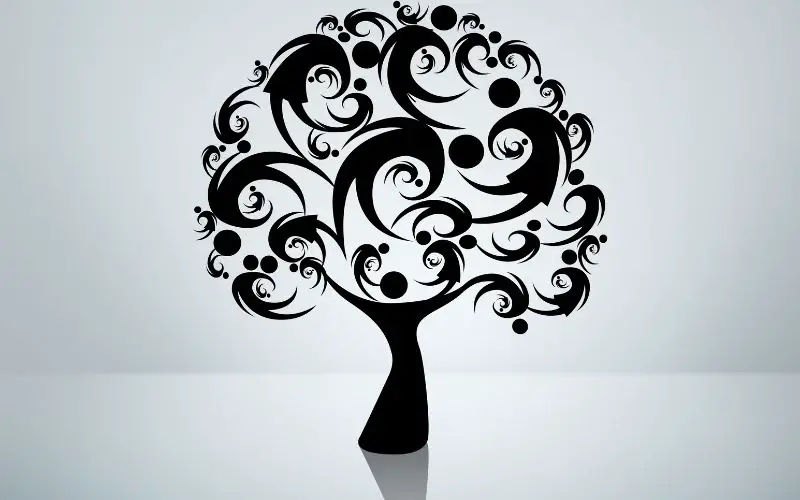 Photo showing a silhouette of people in a form of a tree