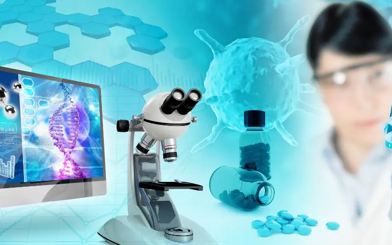 Image showing a pc monitor with DNA image, a microscope and a woman scientist 